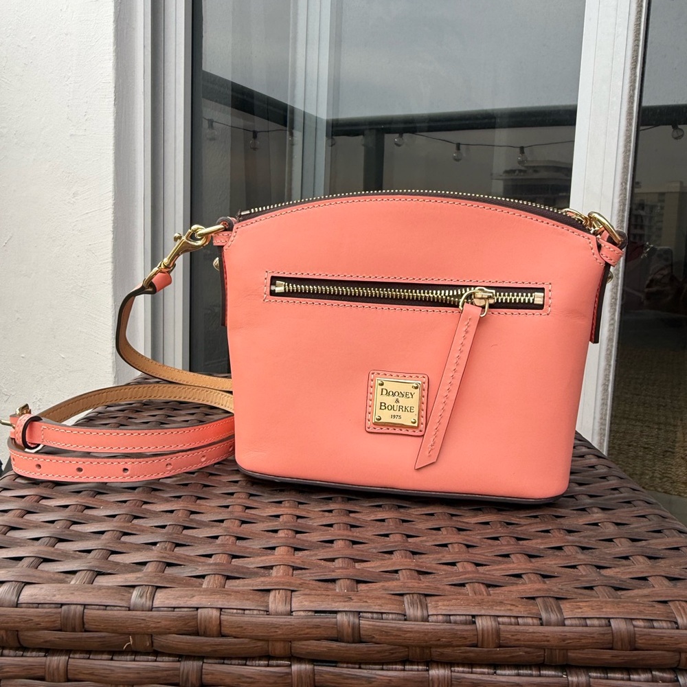 Dooney & Bourke Pink Crossbody Bag with Gold Accents